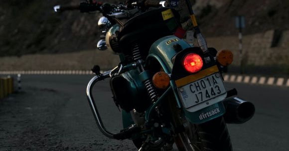 Motorcycle License - Photo of Parked Motorcycle Beside Road