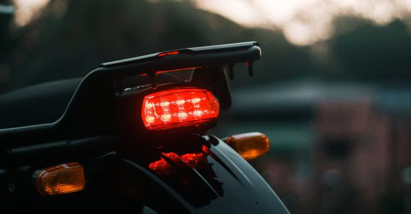 Motorcycle License Renewal - Black Motorcycle With White and Black License Plate