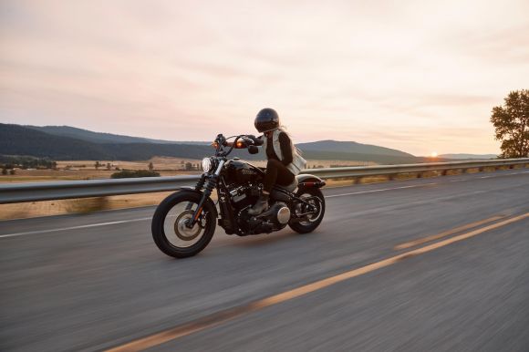 Motorcycle - man on black cruiser motorcycle in highway