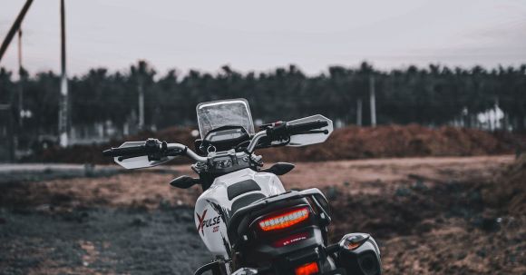 Motorcycle License: Minors - Motorcycle Parked on Dirt Road