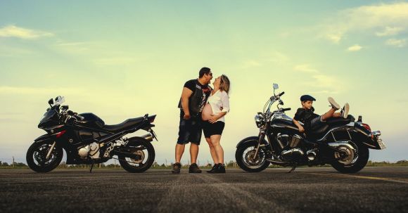 Motorcycle License Exam Expectations - Couple Posing Near Motorcycles
