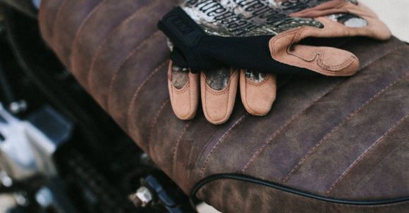 Moto Riding - Motorbike with gloves parked on road