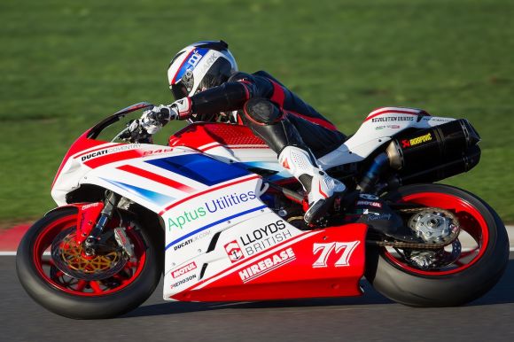 Sport Motorbikes - person riding red and white sportbike