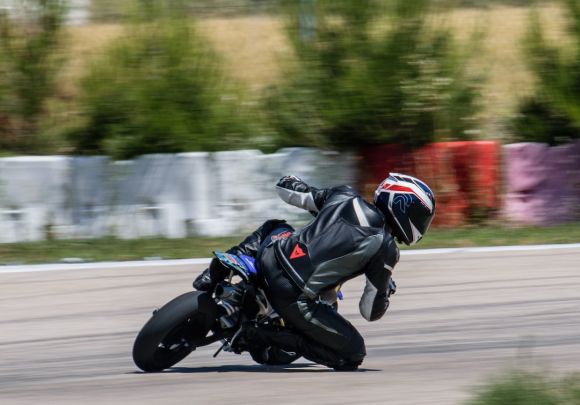Sport Motorbikes - panning photography of rider riding bike during daytie
