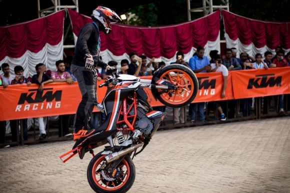 Sport Motorbikes - man doing tricks while riding on dirt bike