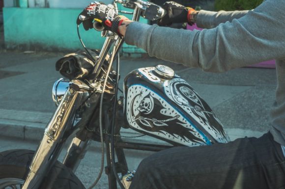 Moto Riding - person in gray jacket riding on motorcycle