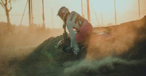 Moto Riding - A Person Riding a Dirt Bike