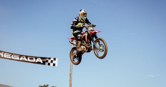 Off-road Skills - A Man Riding Motocross Dirt Bike