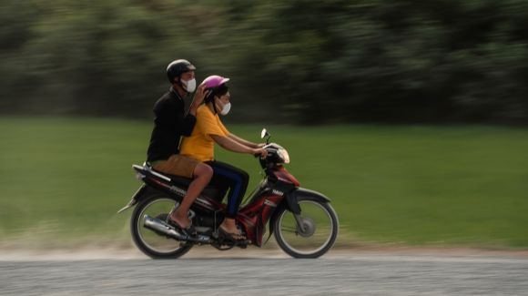 Moto Riding - man in yellow shirt riding motorcycle on road during daytime