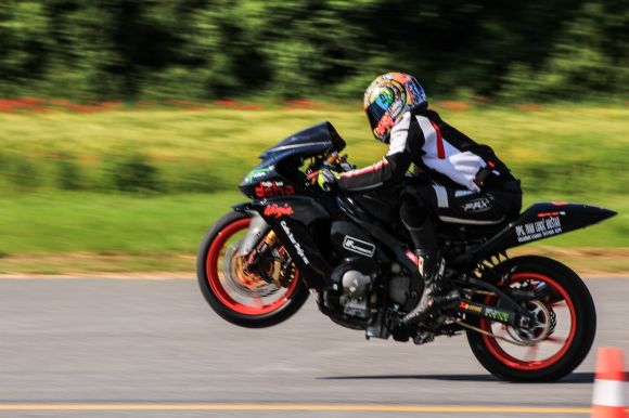 Motobike - person riding motorcycle