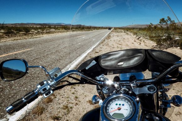 Highway Motorcycle - touring motorcycle beside farm road