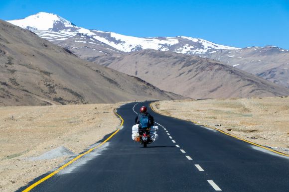 Motorcycle Trip - man riding motorcycle on road during daytime