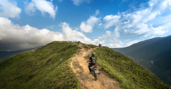 Motorcycle Exploration - Person Riding on Motorcycle on Mountain