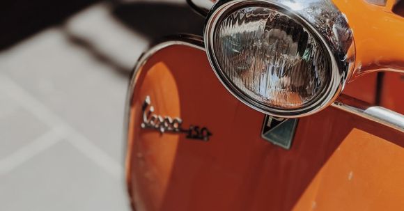 Motorcycle Coverage - Orange Motorcycle on Gray Concrete Road