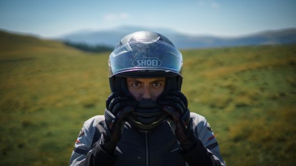 Motorcycle Helmet - man in black and white jacket wearing helmet