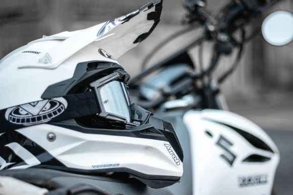 Motorcycle Helmet - person wearing white motocross helmet