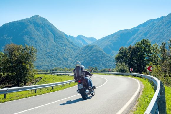Motorcycle Trip - man riding motorcycle on road during daytime