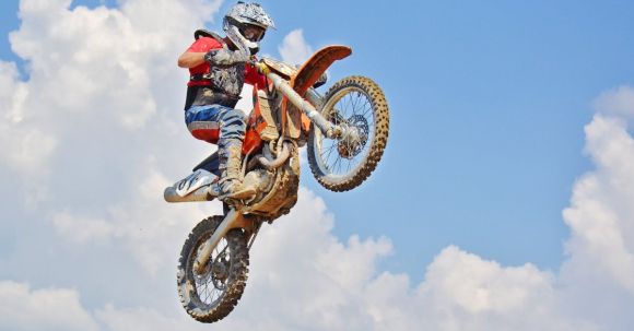 Adventure Motorcycle - Man On A Motocross Dirt Bike