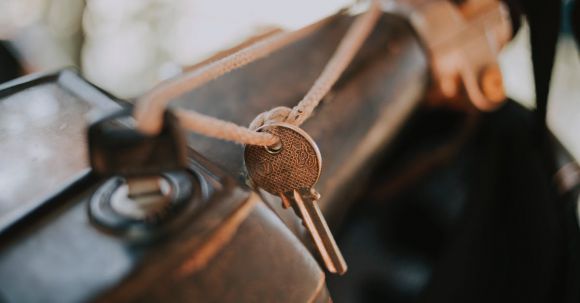 Motorcycle Security. - Home key and moto key on rope