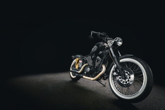 Motorcycle - black bone motorcycle on black background