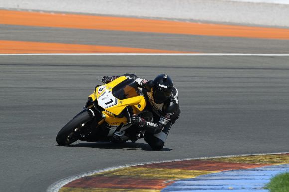 Moto Maintenance - man riding yellow sportbike