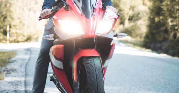 Motorcycle Safety - Person Riding Red Sports Bike