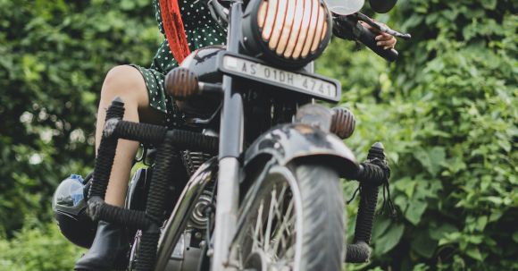 Riding Posture - Photo of Woman Riding Motorcycle