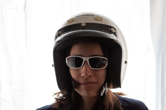Motorcycle Helmet - woman wearing black and white helmet