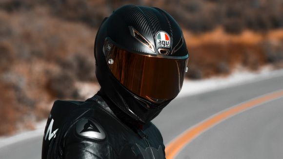 Motorcycle Helmet - man in black helmet and black jacket