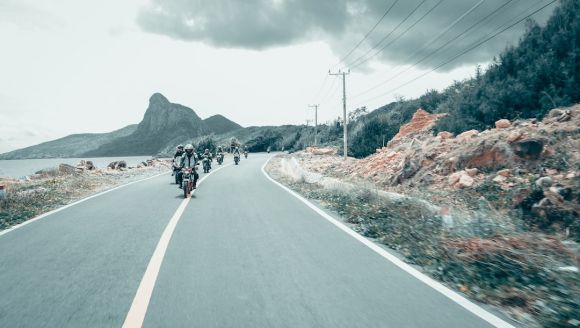 Motorcycle Trip - group of people riding motorcycle on road