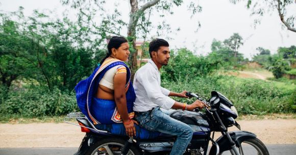 Motorcycle Passenger Age - Man and Woman Riding on Motorcycle