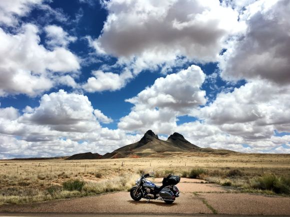 Motorcycle Tour - parked touring motorcycle under blue sky during daytime