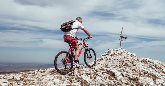 Rocky Riding. - Man Riding Bicycle on Off-road