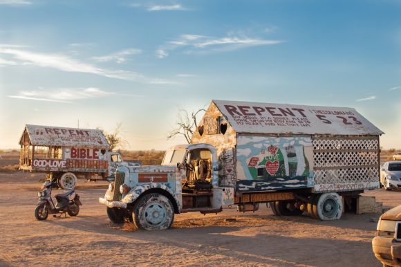 Motorcycle Mountain - store truck parked on dessert field