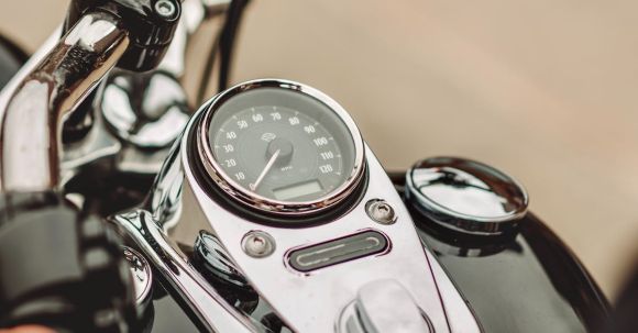 Motorcycle Steering Troubleshooting - Clock and the Handlebars of a Motorcycle