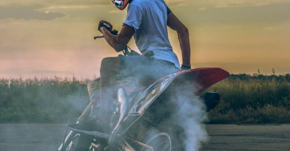 Motorcycle Priority - Photo of Man Riding Motorcycle