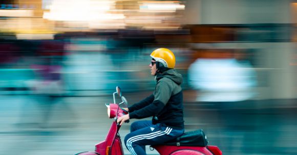 Motorcycle Coverage - Photo of Man Riding Red Motor Scooter