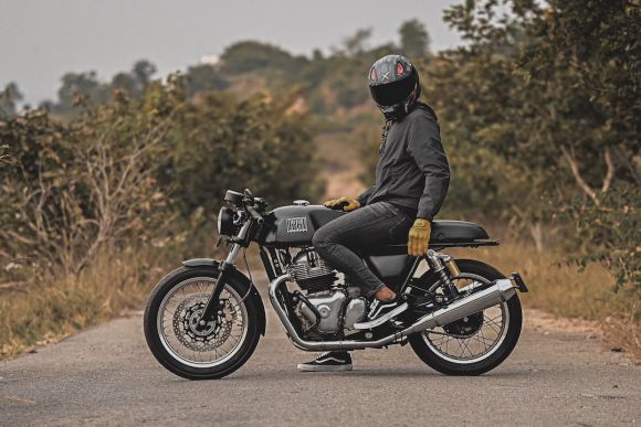 Moto Gloves - man in black jacket riding motorcycle on road during daytime